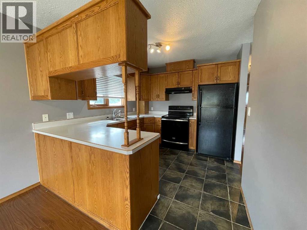 107 Assiniboine Drive, Swan Hills, Alberta  T0G 2C0 - Photo 4 - A2156535