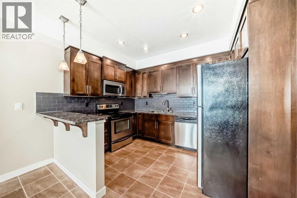 206, 1005b Westmount Drive, Strathmore, Alberta  T1P 0C3 - Photo 2 - A2306248