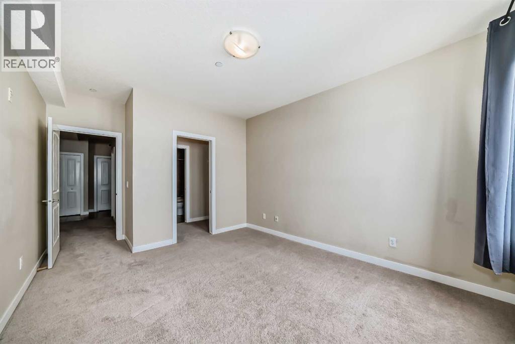 206, 1005b Westmount Drive, Strathmore, Alberta  T1P 0C3 - Photo 21 - A2306248