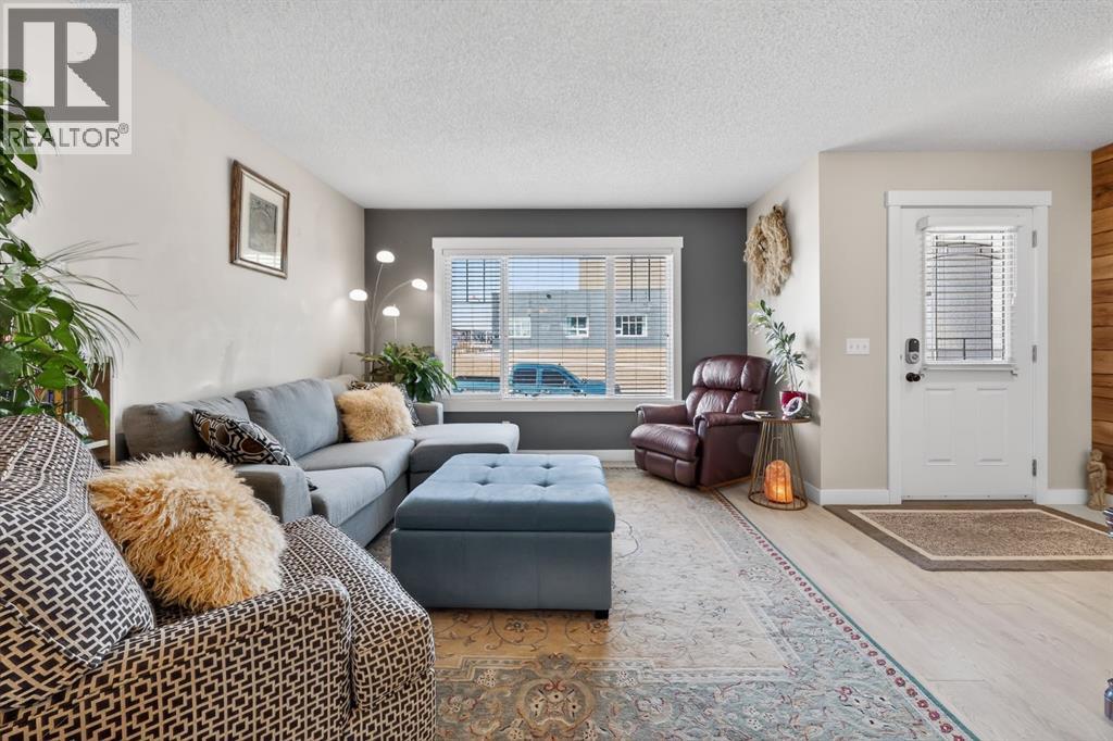 203 Fireside Parkway, Cochrane, Alberta  T4C 0V8 - Photo 3 - A2296249