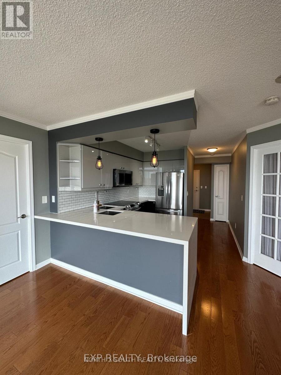 1002 - 1150 Parkwest Place, Mississauga, Ontario  L5E 3K4 - Photo 1 - W13058406