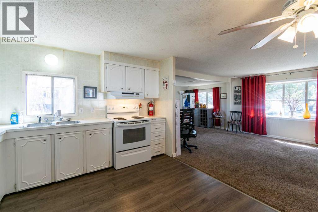 4 48a Street Close, Alix, Alberta  T0C 0B0 - Photo 6 - A2306091