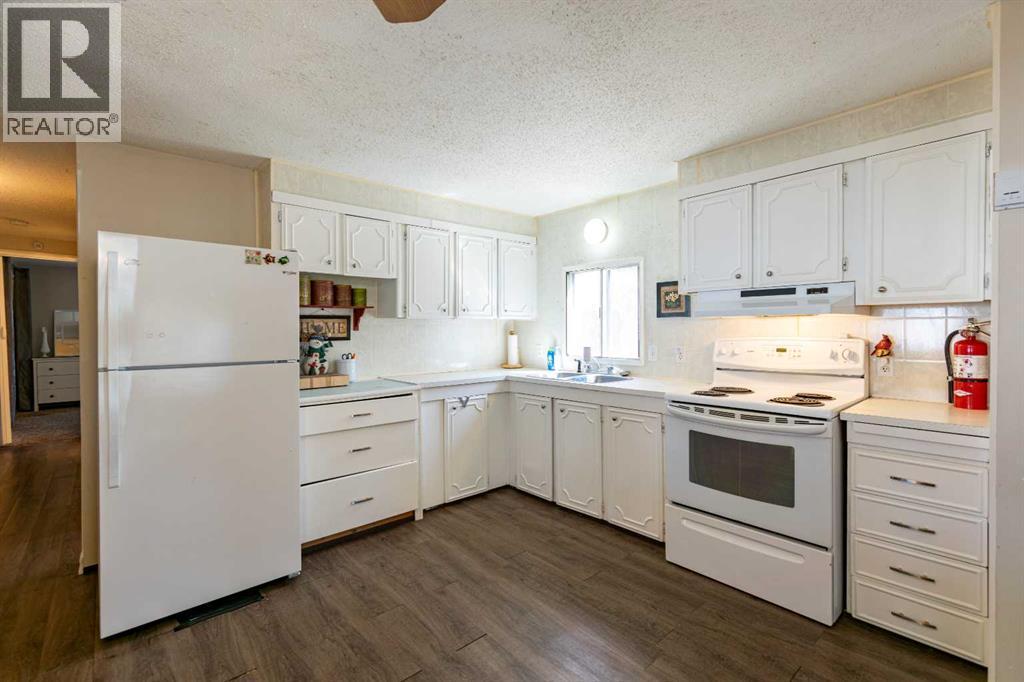 4 48a Street Close, Alix, Alberta  T0C 0B0 - Photo 7 - A2306091