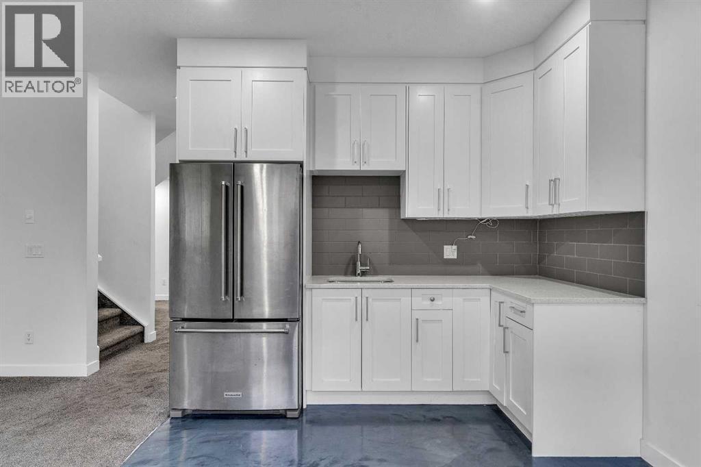 205 Kinniburgh Cove, Chestermere, Alberta  T1X 0Y6 - Photo 39 - A2306295