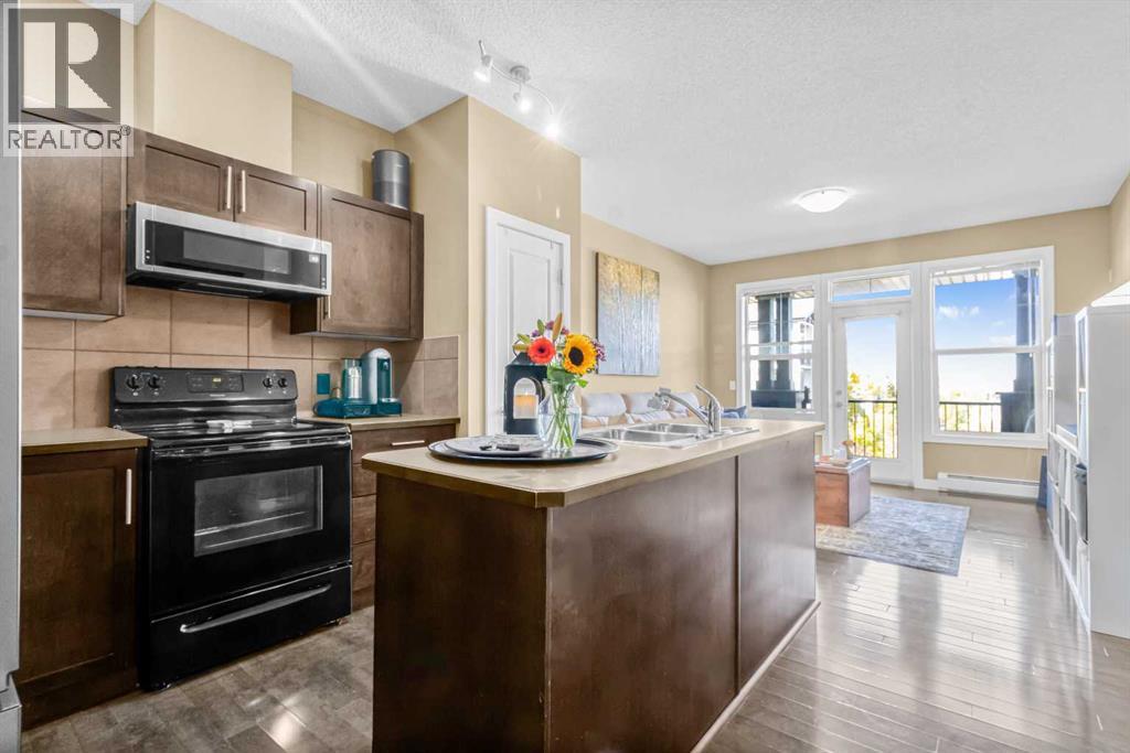 306, 10 Panatella Road Nw, Calgary, Alberta  T3K 0V4 - Photo 4 - A2304829