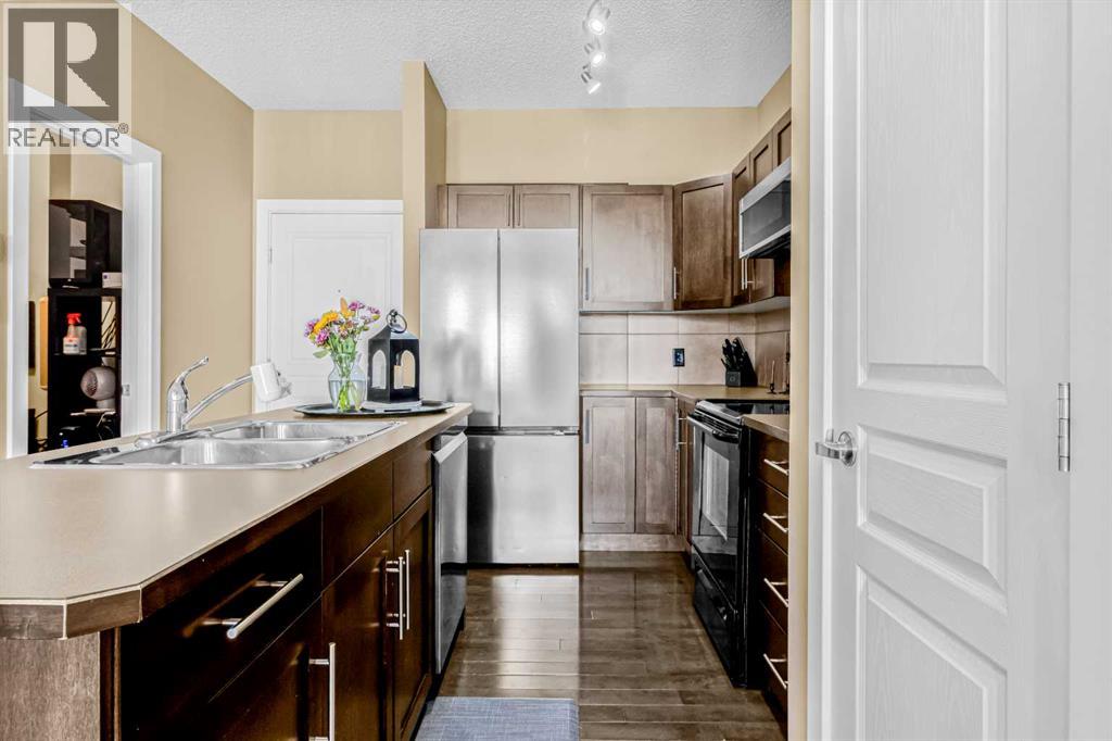 306, 10 Panatella Road Nw, Calgary, Alberta  T3K 0V4 - Photo 6 - A2304829