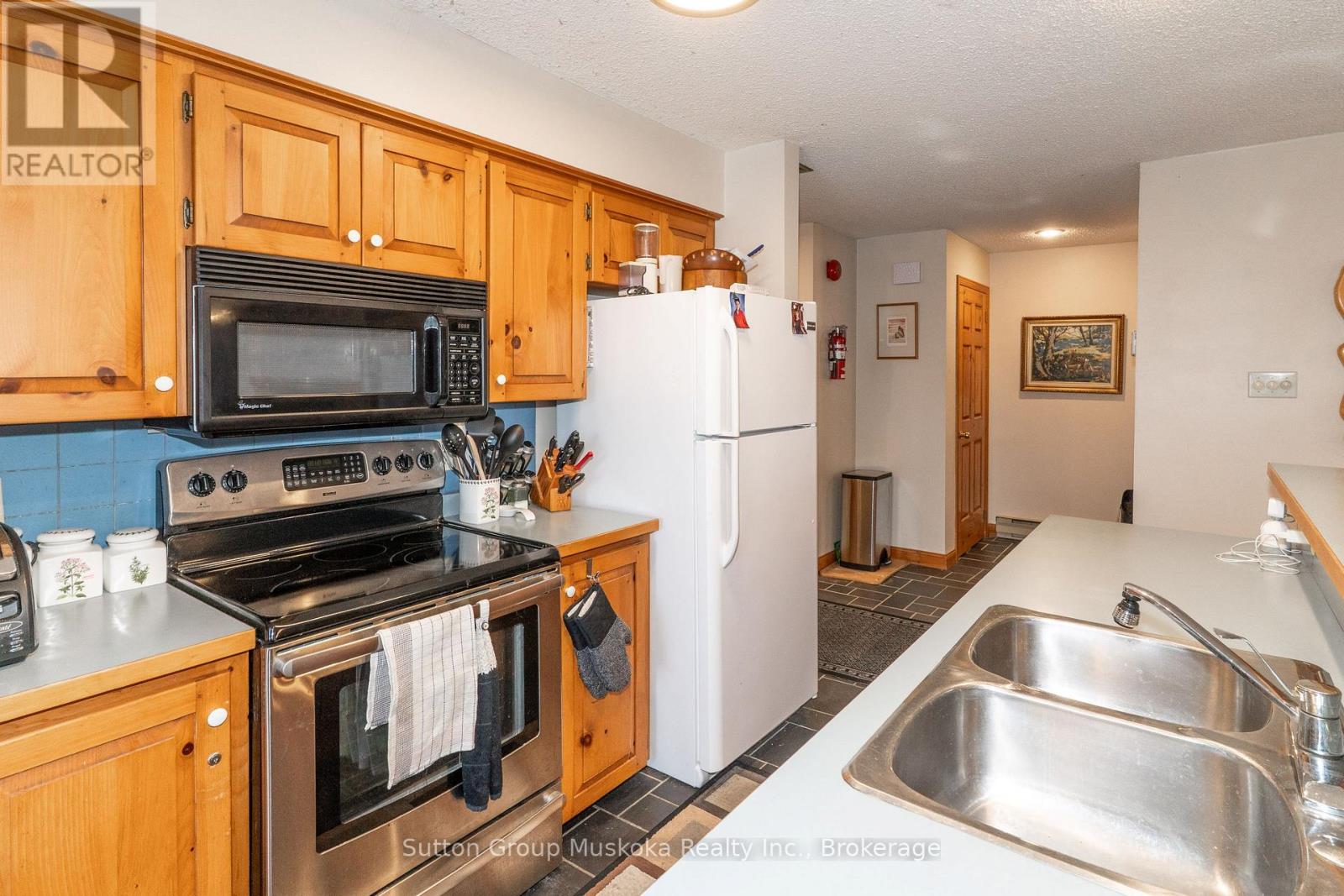 22-102 Oakridge - Deerhurst Resort Drive, Huntsville, Ontario  P1H 2E8 - Photo 9 - X12904142