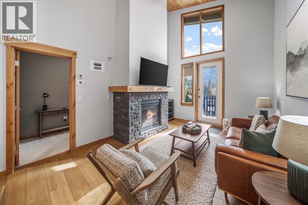 405, 1408 Spring Creek Gate, Canmore, Alberta  T1W 0N5 - Photo 2 - A2306007