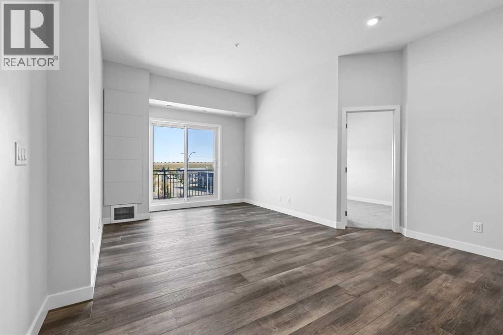 406, 255 Les Jardins Park SE, Calgary, Alberta  T2C 5W9 - Photo 6 - A2273851