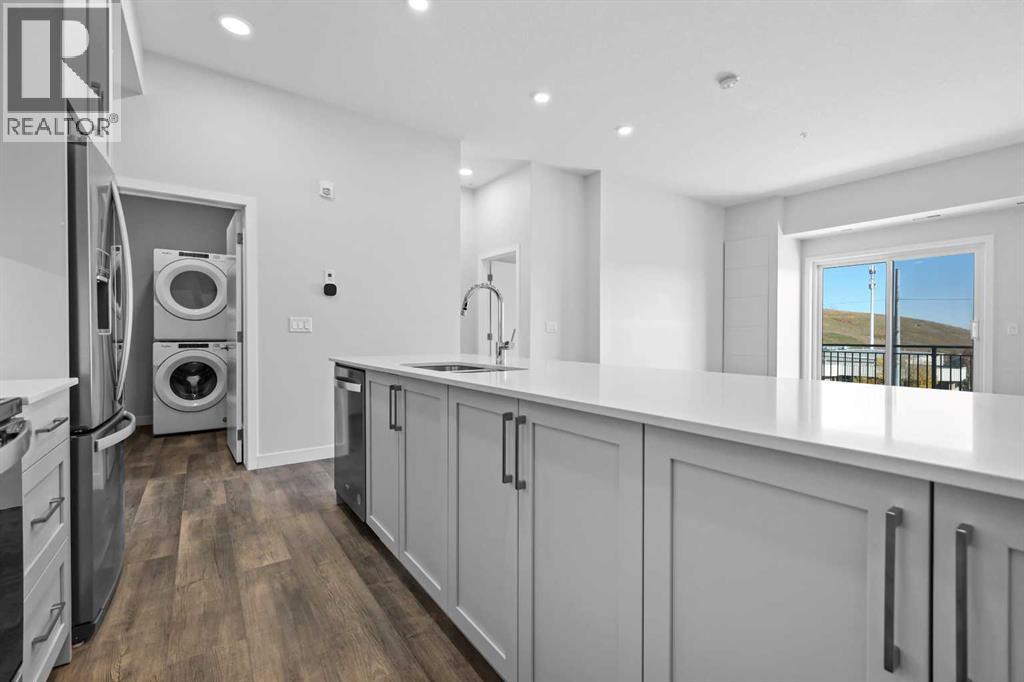 406, 255 Les Jardins Park SE, Calgary, Alberta  T2C 5W9 - Photo 4 - A2273851