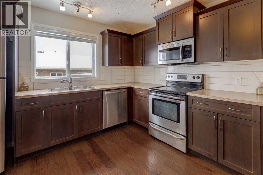 16 Fireside Way, Cochrane, Alberta  T4C 0R1 - Photo 6 - A2280445