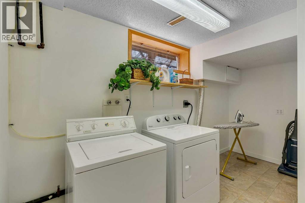 9 Mountain Place, Okotoks, Alberta  T1S 1G7 - Photo 46 - A2304951