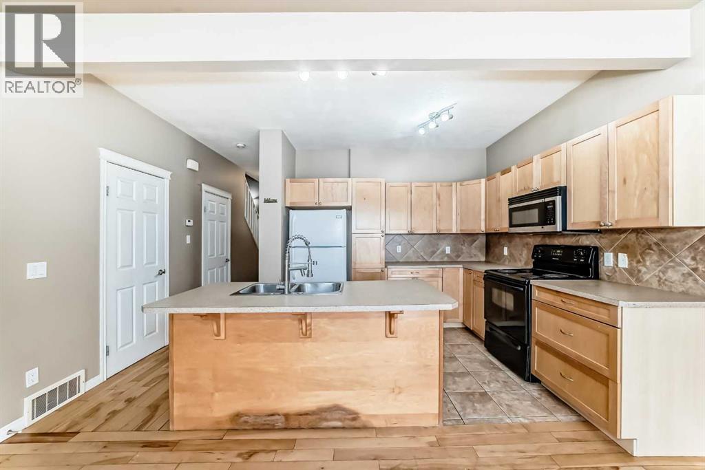 207, 620 Luxstone Landing SW, Airdrie, Alberta  T4B 0B5 - Photo 6 - A2291301