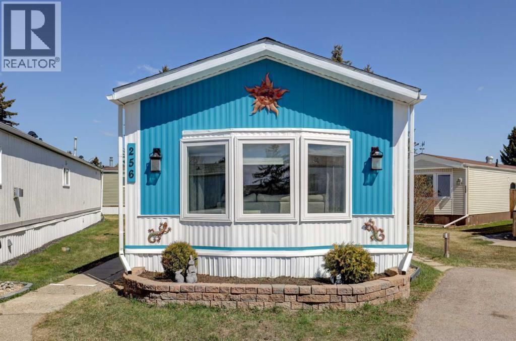 256 Burroughs Circle Ne, Calgary, Alberta  T1Y 6K3 - Photo 1 - A2305485