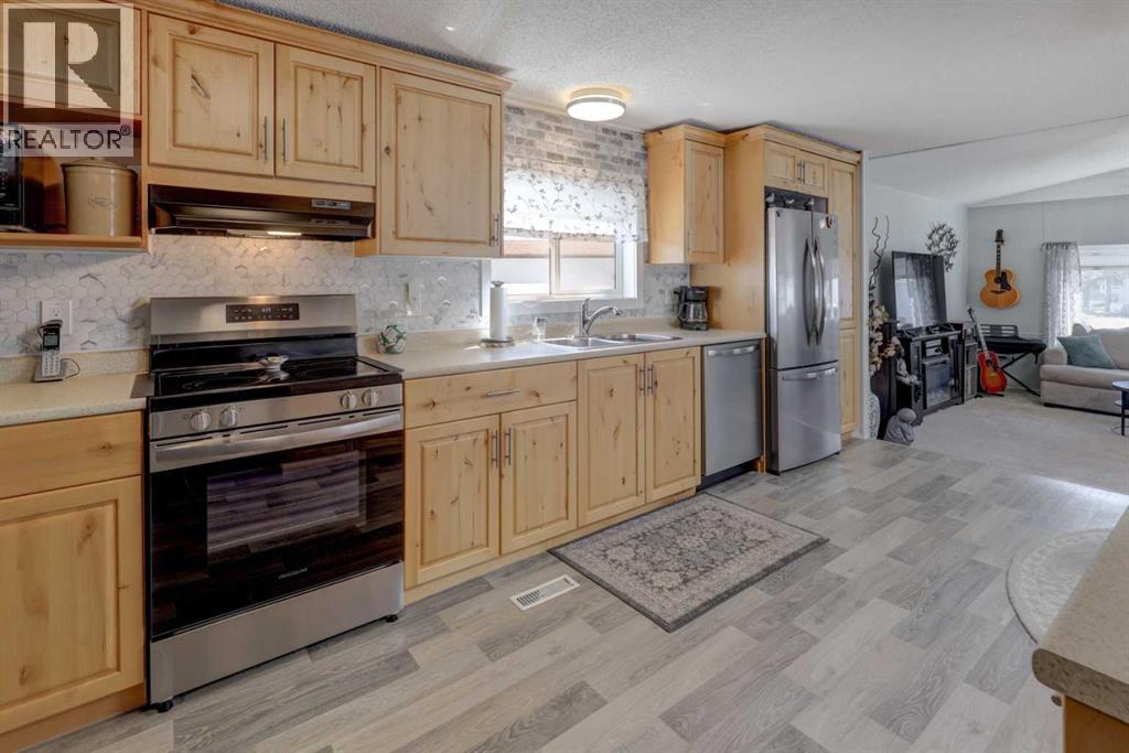 256 Burroughs Circle Ne, Calgary, Alberta  T1Y 6K3 - Photo 3 - A2305485