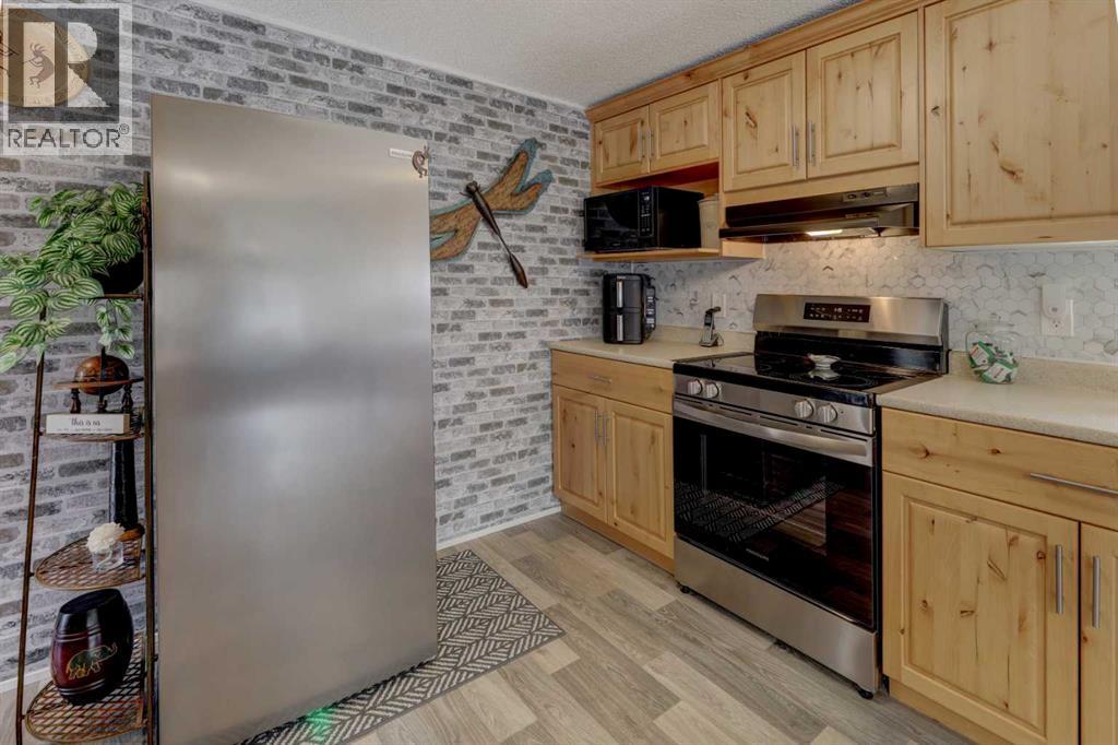 256 Burroughs Circle Ne, Calgary, Alberta  T1Y 6K3 - Photo 6 - A2305485