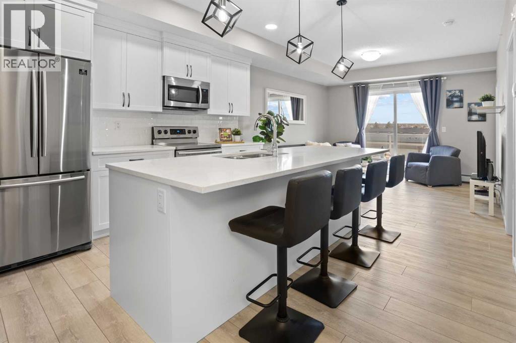 406, 370 Harvest Hills Common Ne, Calgary, Alberta  T3K 2M8 - Photo 2 - A2285239