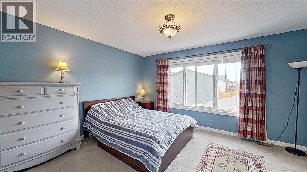 109 Heartland Boulevard, Cochrane, Alberta  T4C 2R1 - Photo 16 - A2292507