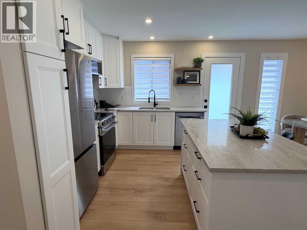 129 Coventry Place NE, Calgary, Alberta  T3K 4A6 - Photo 9 - A2289332