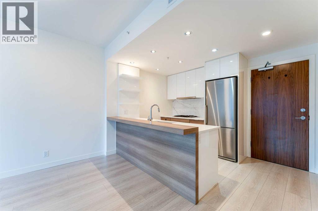 401, 138 Waterfront Court SW, Calgary, Alberta  T2P 1L1 - Photo 10 - A2299050