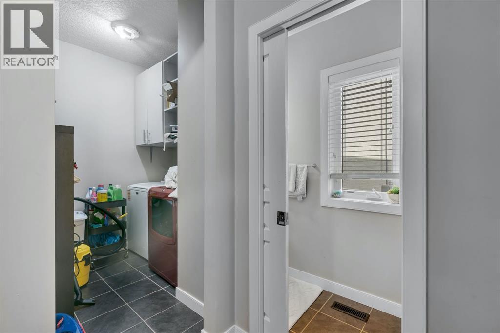 52 West Coach Court Sw, Calgary, Alberta  T3H 0N1 - Photo 11 - A2306351