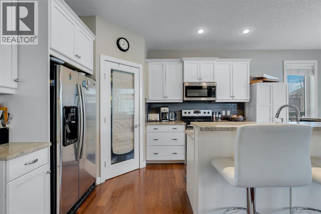 52 West Coach Court Sw, Calgary, Alberta  T3H 0N1 - Photo 6 - A2306351