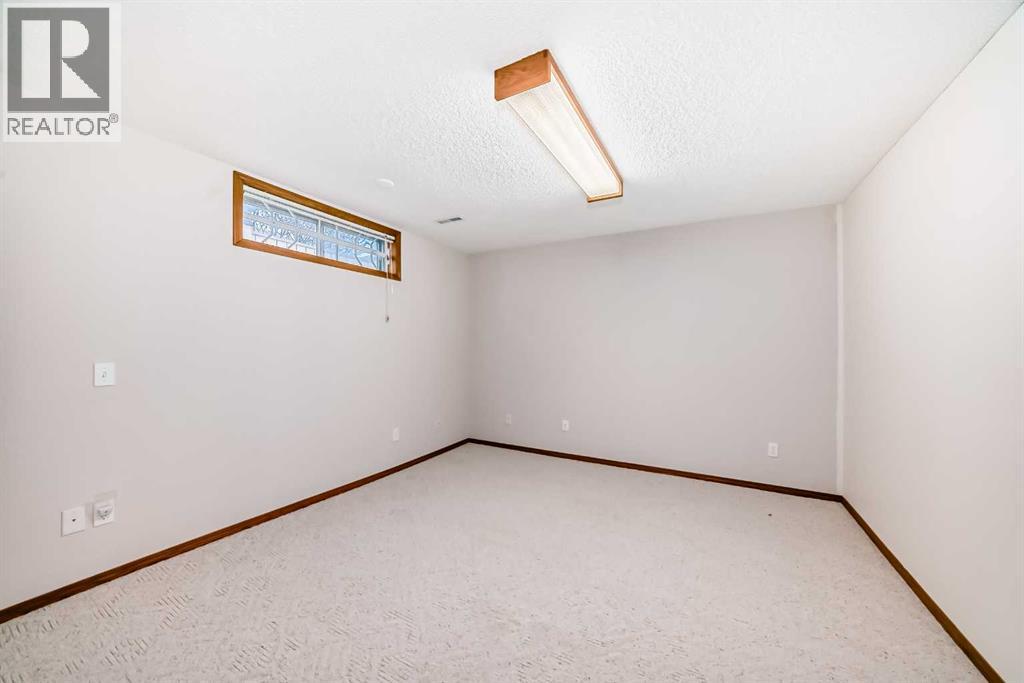 164 Macewan Park Circle Nw, Calgary, Alberta  T3K 4A2 - Photo 31 - A2306300