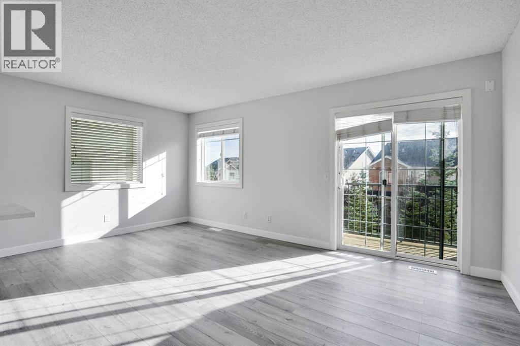 137 Pantego Lane NW, Calgary, Alberta  T3K 0T1 - Photo 5 - A2292494