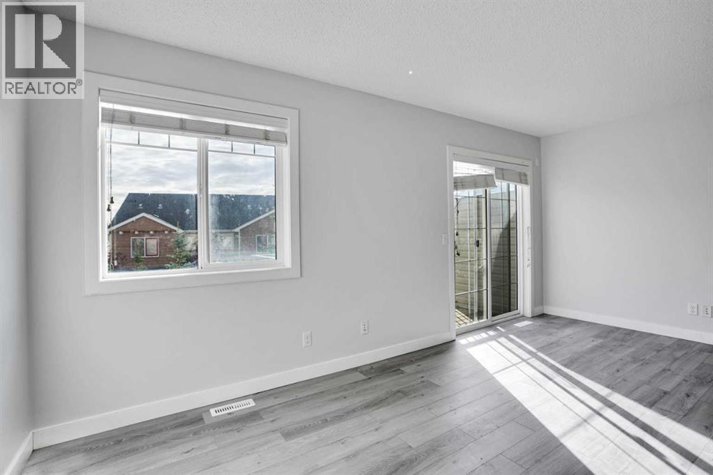 137 Pantego Lane NW, Calgary, Alberta  T3K 0T1 - Photo 6 - A2292494