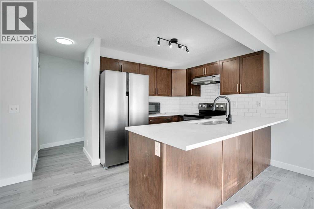 137 Pantego Lane NW, Calgary, Alberta  T3K 0T1 - Photo 9 - A2292494