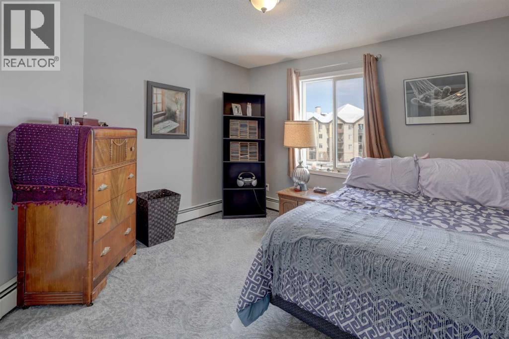 7303, 304 Mackenzie Way SW, Airdrie, Alberta  T4B 3H7 - Photo 26 - A2296988