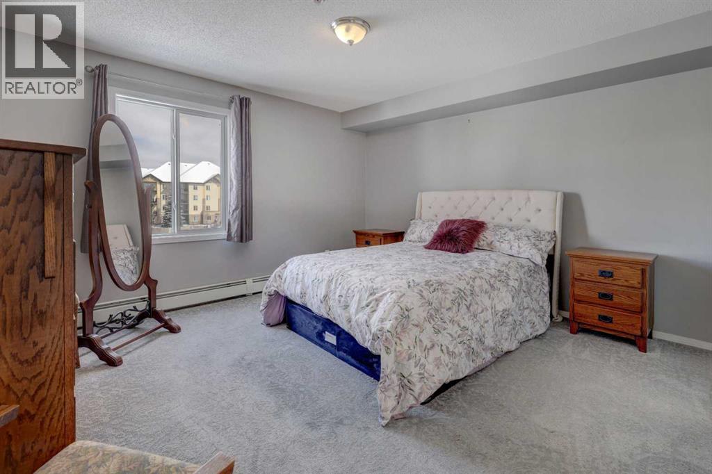 7303, 304 Mackenzie Way SW, Airdrie, Alberta  T4B 3H7 - Photo 21 - A2296988