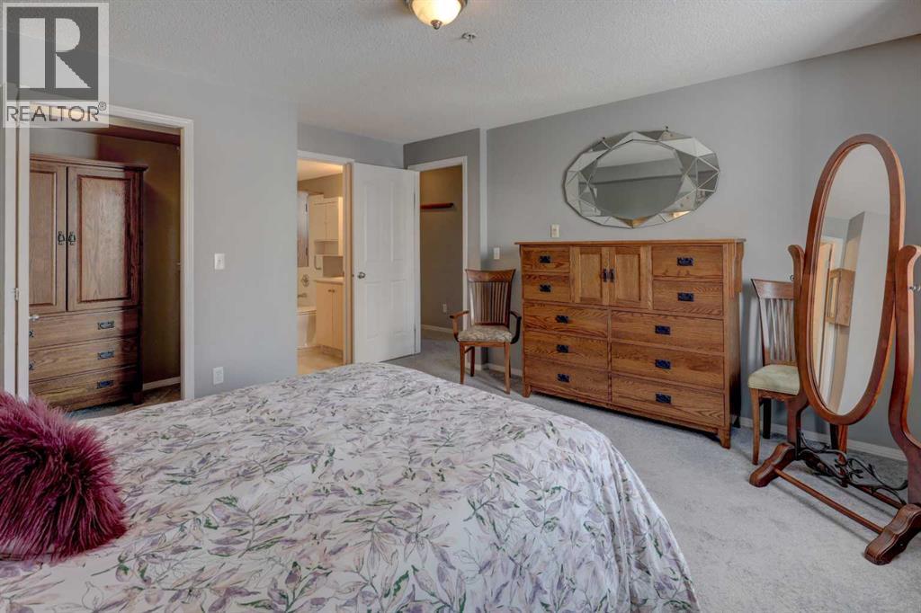 7303, 304 Mackenzie Way SW, Airdrie, Alberta  T4B 3H7 - Photo 23 - A2296988