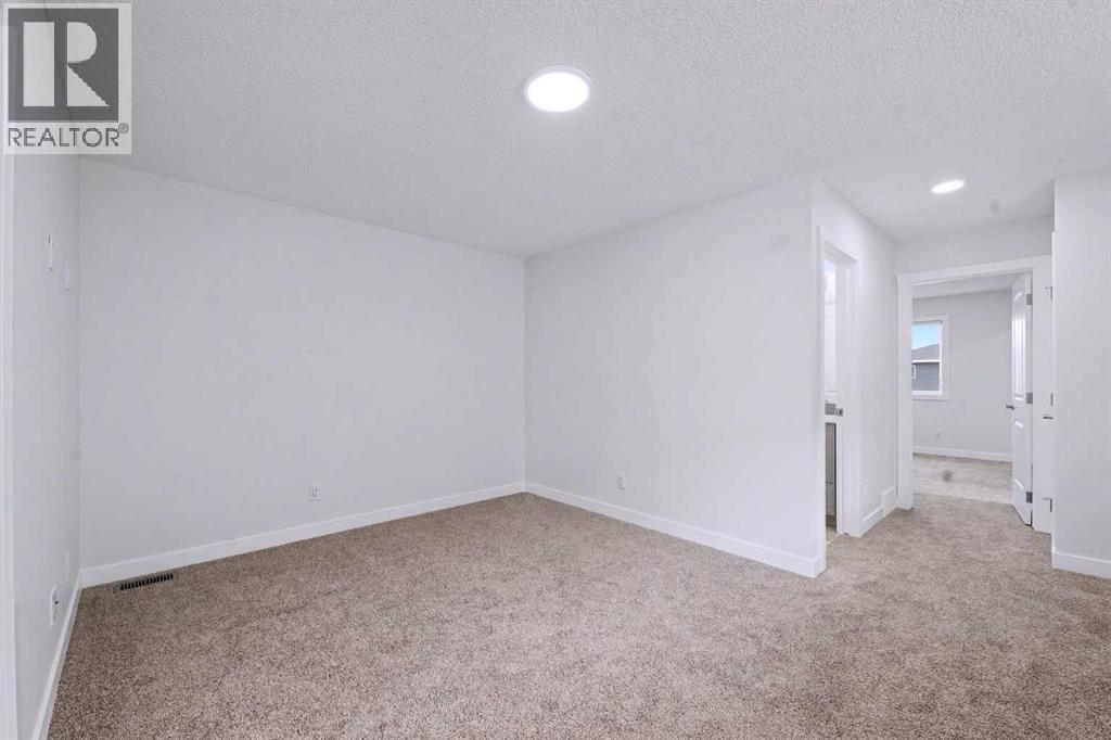 526 Wolf Willow Boulevard SE, Calgary, Alberta  T2X 5P7 - Photo 21 - A2278771