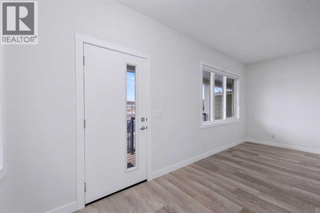 526 Wolf Willow Boulevard SE, Calgary, Alberta  T2X 5P7 - Photo 7 - A2278771
