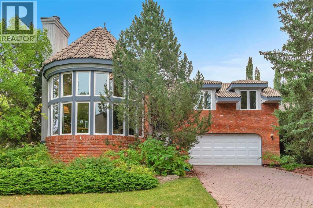 656 Coach Grove Road SW, Calgary, Alberta  T3H 1C6 - Photo 1 - A2304869