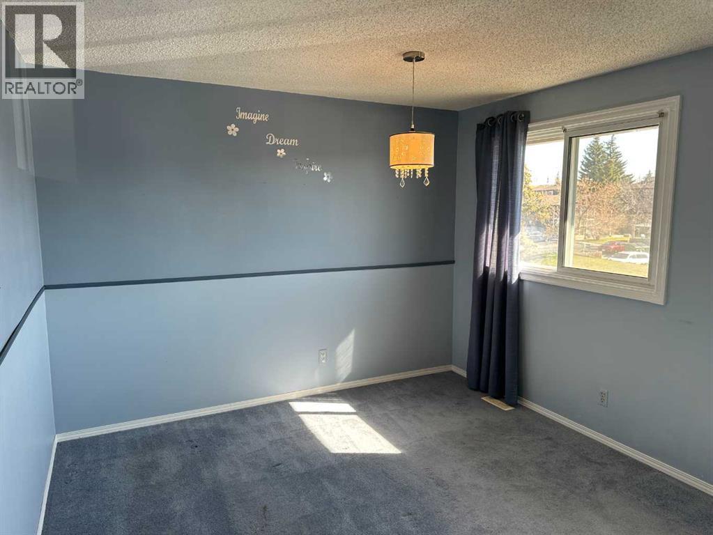 100, 740 Bracewood Drive SW, Calgary, Alberta  T2W 3N3 - Photo 15 - A2305600