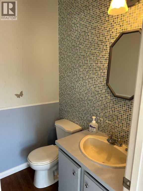 100, 740 Bracewood Drive SW, Calgary, Alberta  T2W 3N3 - Photo 14 - A2305600