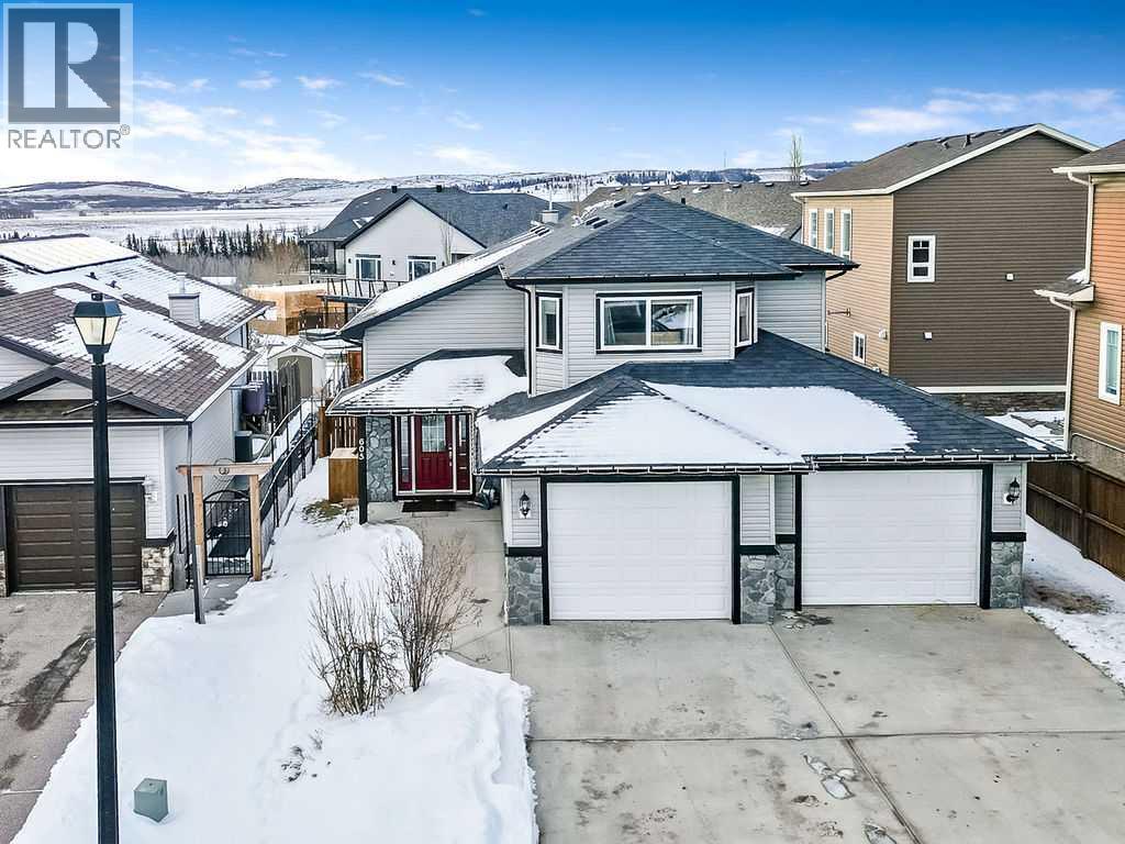 605 Sunrise Close, Diamond Valley, Alberta  T0L 2A0 - Photo 42 - A2276075