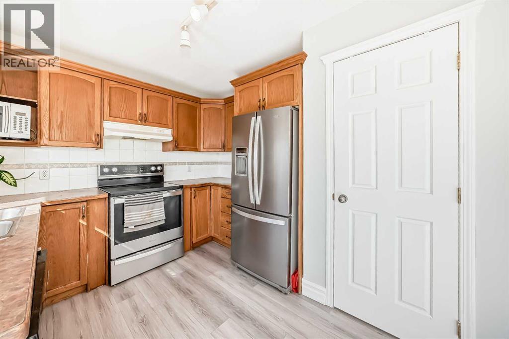 47 Silver Creek Boulevard NW, Airdrie, Alberta  T4B 2P6 - Photo 7 - A2298960