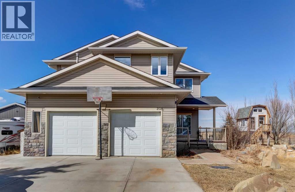 208 Railway Avenue, Cheadle, Alberta  T1P 0X8 - Photo 1 - A2286052
