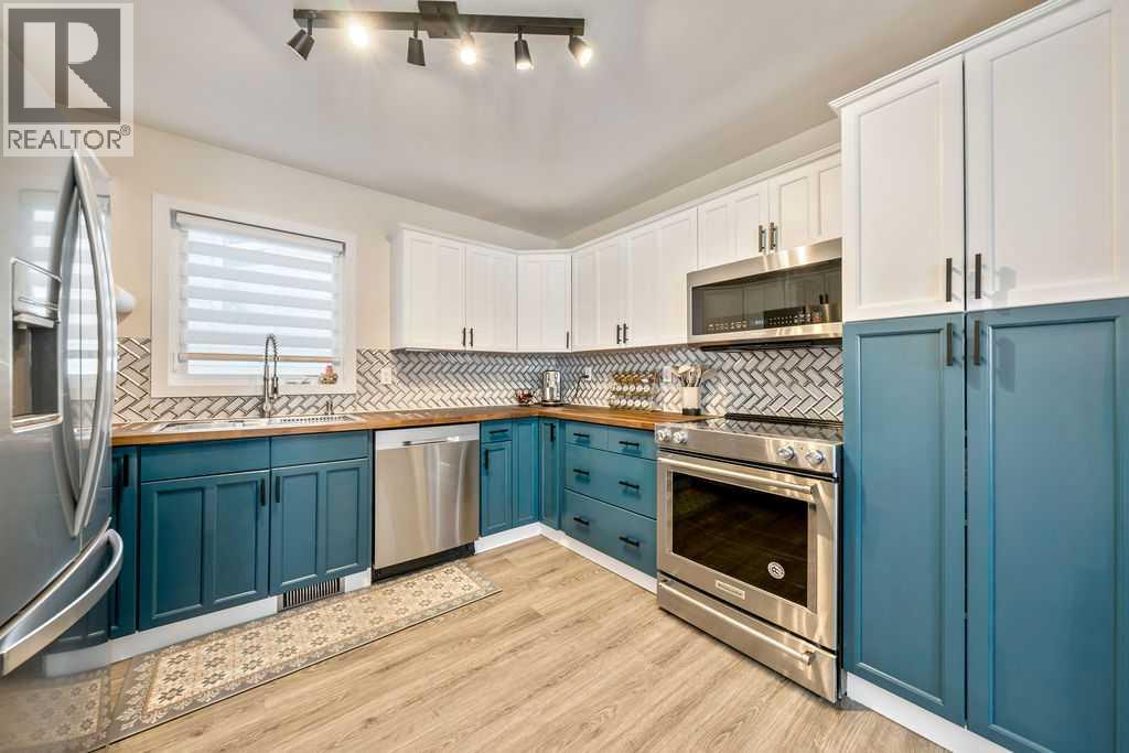 5 Shawglen Court SW, Calgary, Alberta  T2Y 2R1 - Photo 8 - A2303815