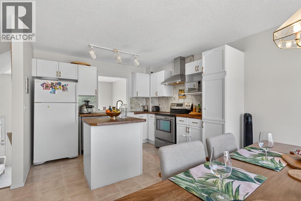 121 Rocky Ridge Court NW, Calgary, Alberta  T3G 4S7 - Photo 12 - A2302580