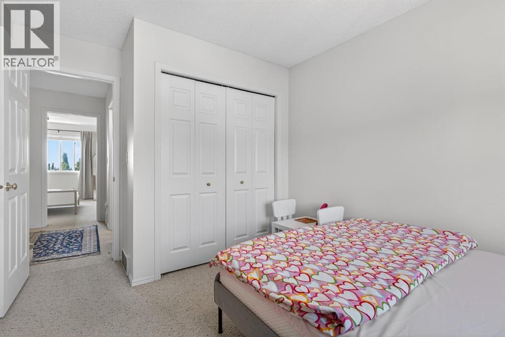 121 Rocky Ridge Court NW, Calgary, Alberta  T3G 4S7 - Photo 29 - A2302580