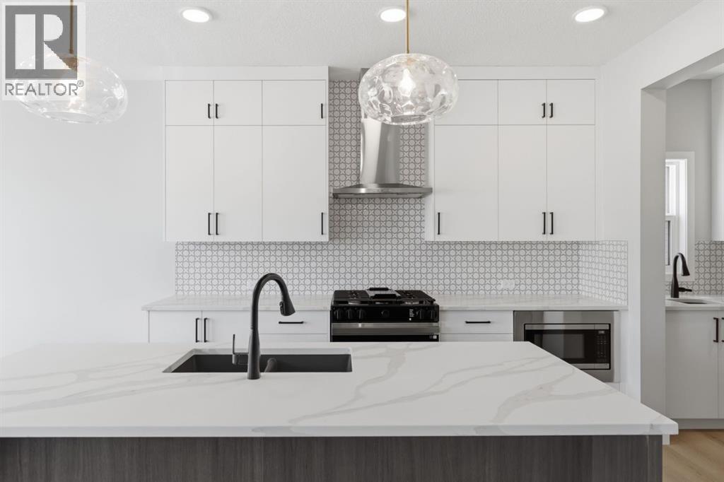 132 Lewiston Drive NE, Calgary, Alberta  T3P 2H9 - Photo 5 - A2267544