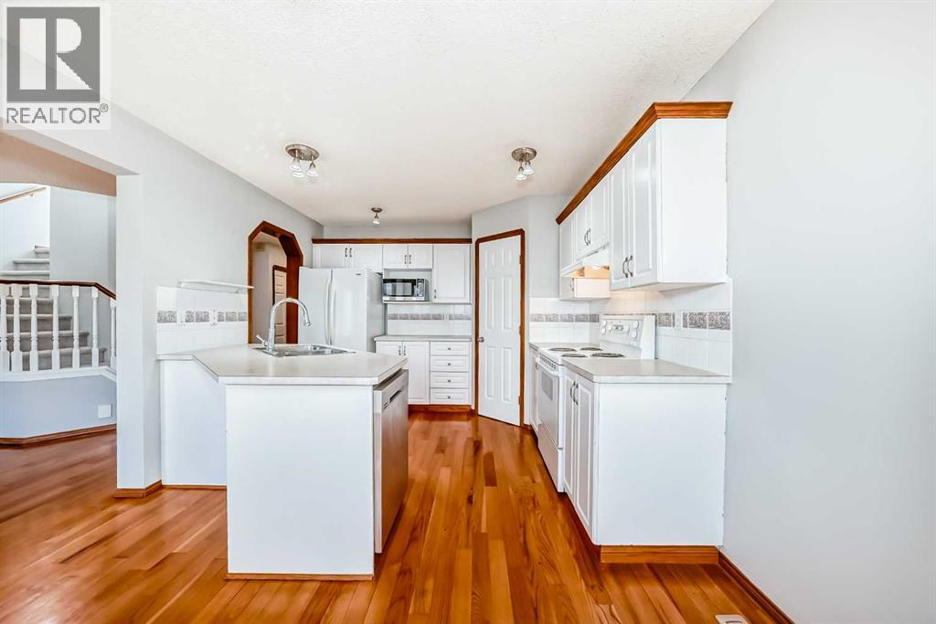 128 Harvest Park Road NE, Calgary, Alberta  T3K 4H9 - Photo 4 - A2305181