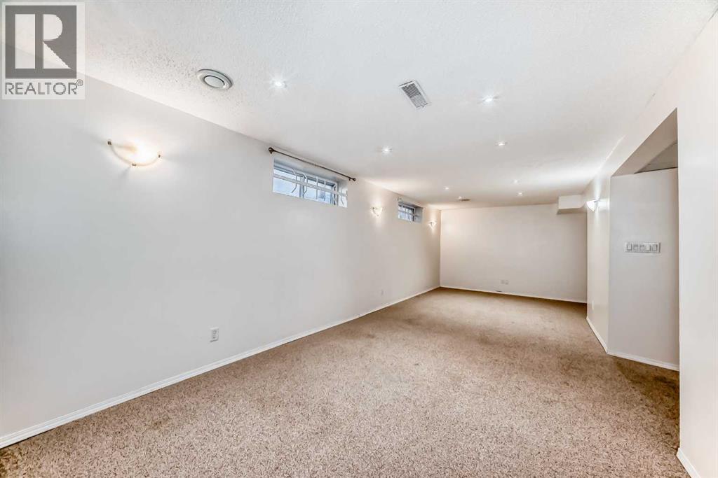 128 Harvest Park Road NE, Calgary, Alberta  T3K 4H9 - Photo 35 - A2305181