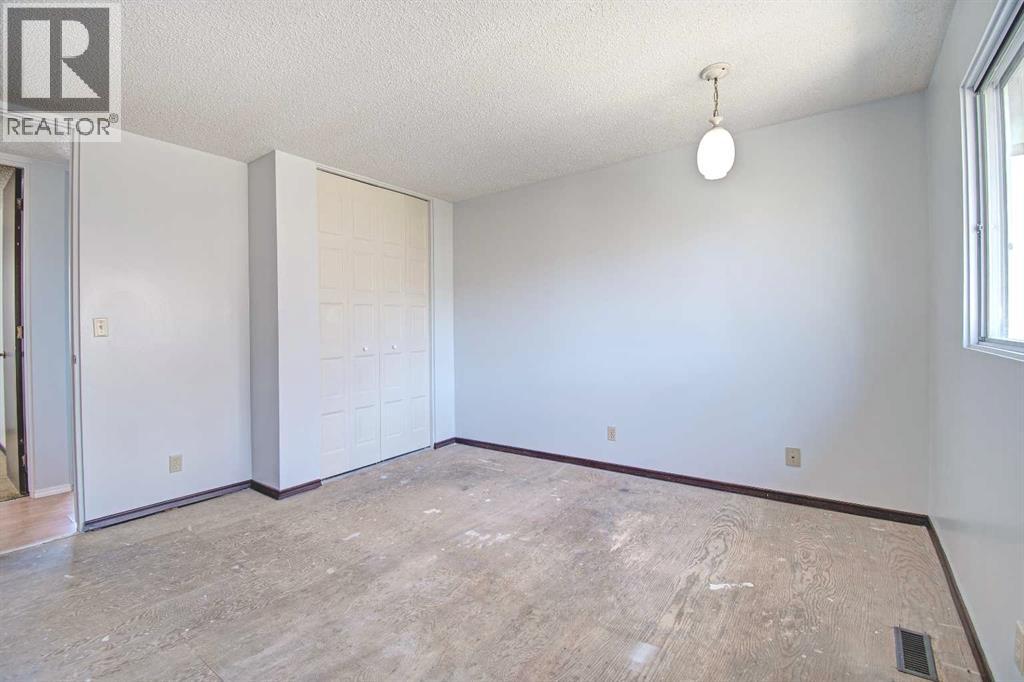 6307 Thornaby Way NW, Calgary, Alberta  T2K 5K8 - Photo 14 - A2292423