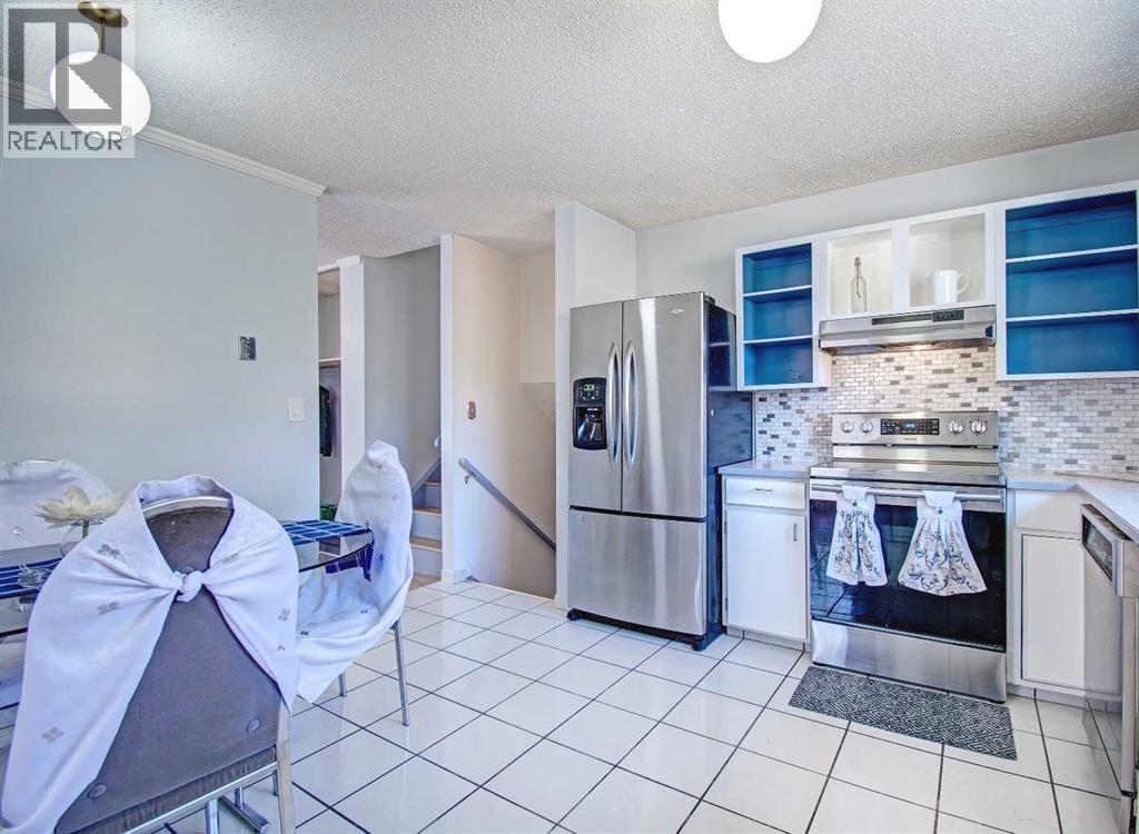 6307 Thornaby Way NW, Calgary, Alberta  T2K 5K8 - Photo 3 - A2292423