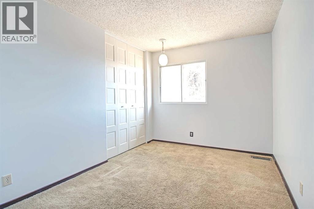 6307 Thornaby Way NW, Calgary, Alberta  T2K 5K8 - Photo 19 - A2292423